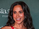 Now Meghan goes solo: Duchess of Sussex ensures all eyes are on her as she rewears revealing red Carolina Herrera gown in surprise appearance at LA children's hospital gala