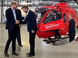 Prince of Wales is joined by David Beckham in the cockpit of a helicopter as he visits the Air Ambulance Charity