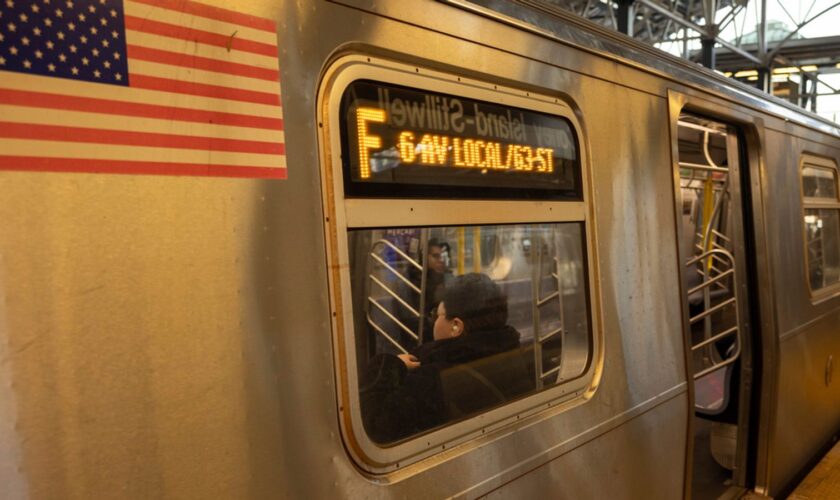 Woman set on fire on New York subway identified by police