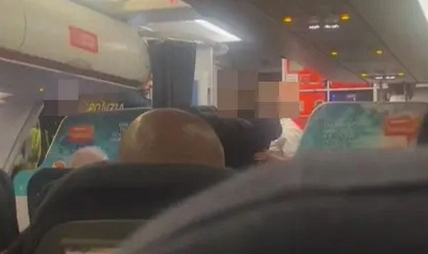 Teen girl ‘pinned down by easyJet crew after trying to open plane door mid-air’