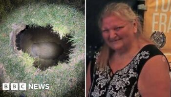 Search under way for woman believed trapped in sinkhole