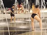 Outrage as adult man in Speedo is caught twerking in children’s fountain